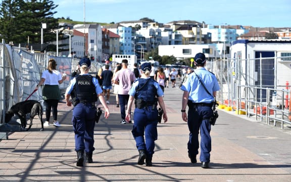 Police patrol near Bondi Beach in Sydney after an extension of the lockdown was announced yesterday.