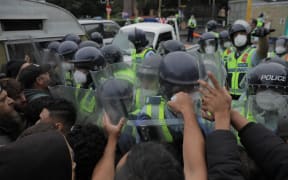 Protesters clash with police on day 23 of the occupation.
