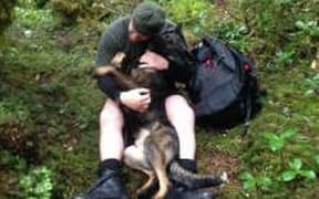 Thames and his dog handler
