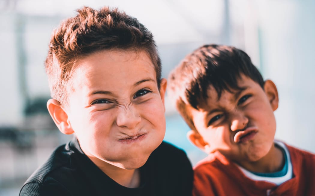 Boys making funny faces