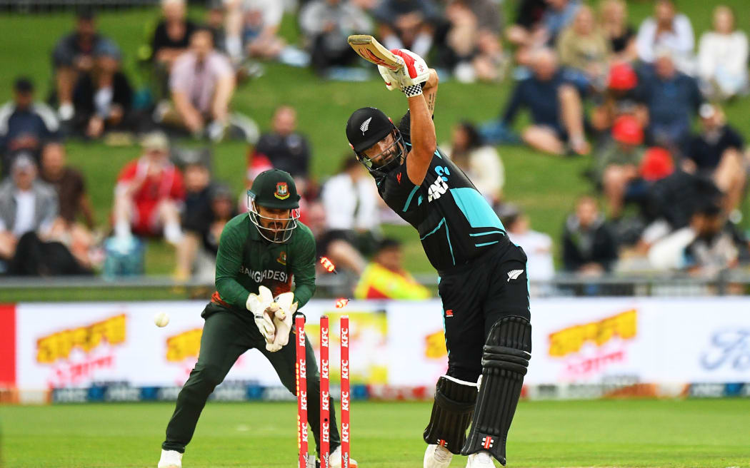 Black Caps batter Daryl Mitchell is bowled during the first T20 international against Bangladesh in Napier.