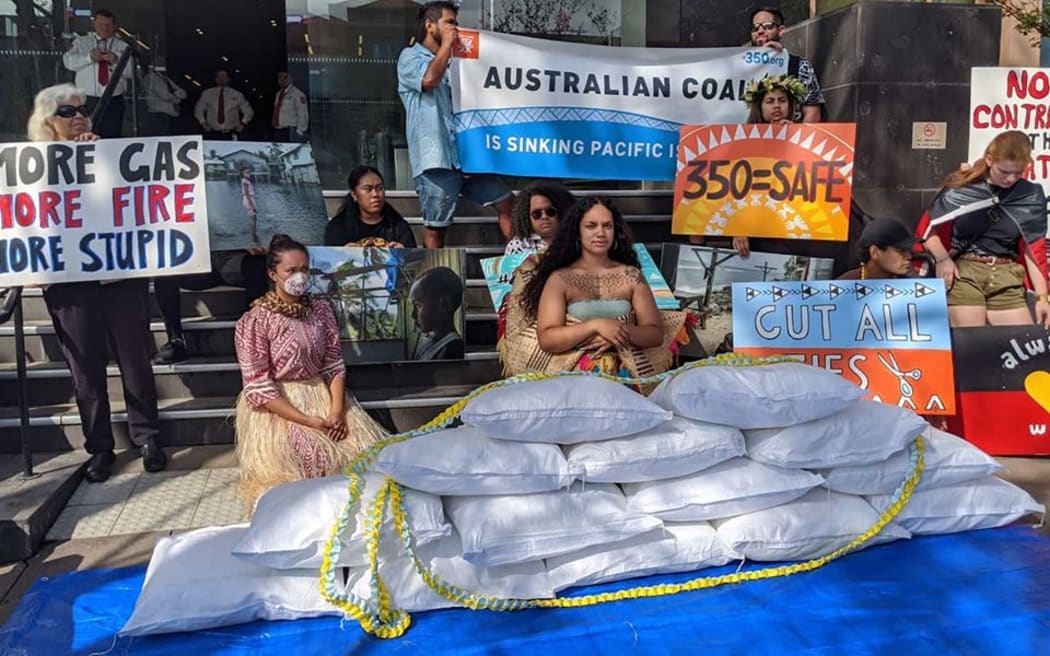 Pacific climate activists demonstrate outside the Australian Parliament