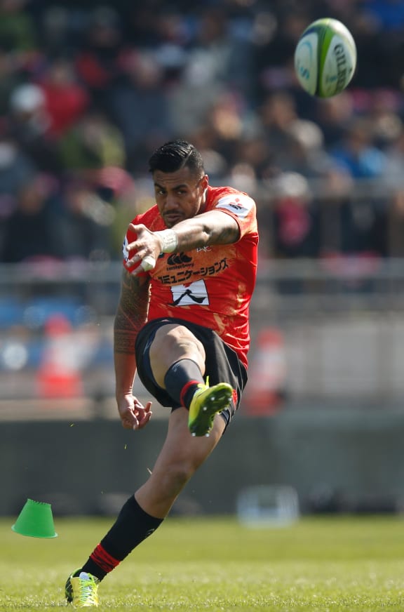 Tusi Pisi take a shot at goal during the Sunwolves debut Super Rugby match against the Lions in Tokyo.