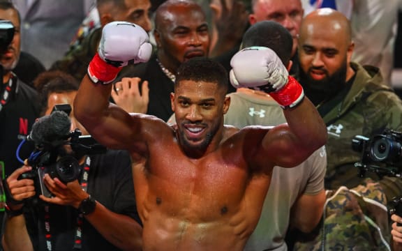 British boxer Anthony Joshua celebrates after defeating US boxer and influencer Jake Paul, 2025.