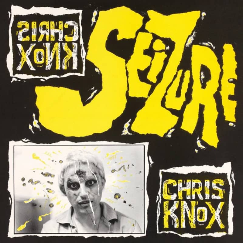 The album cover for Seixure by Chris Knox shows his name, a black and white portrait and the word 'Seizure' written in big yellow wonky letters.