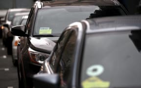 The Uber logo is displayed on a car on March 22, 2019 in San Francisco, California. Uber is piloting a new option for its US app that will allow female passengers to request women drivers, coming after the company has long grappled with preventing sexual assault on its platform.