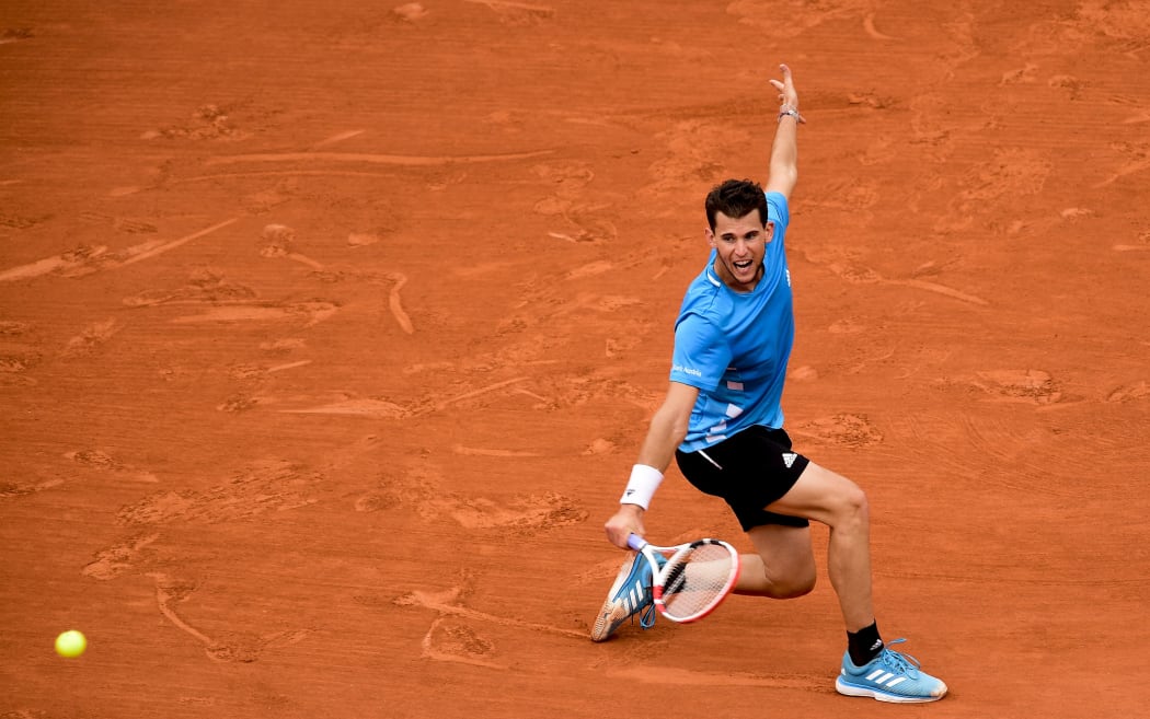Dominic Thiem plays a return shot against Rafael Nadal in the final of the 2019 French Open.