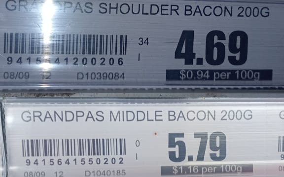 Two supermarket price tags that don't quite add up.
