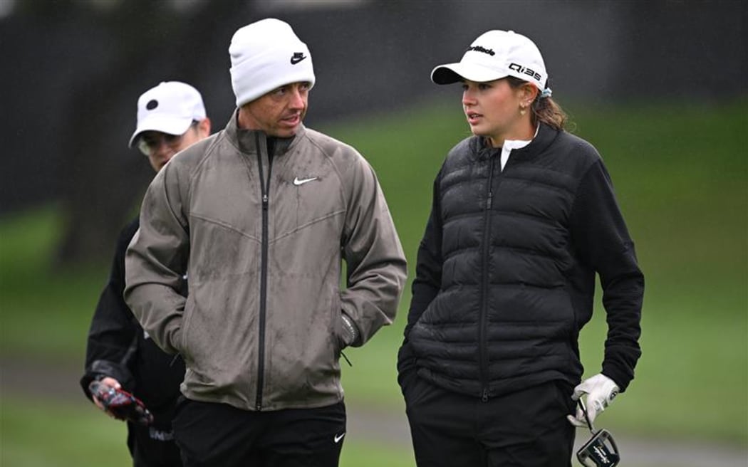 LA JOLLA, CALIFORNIA - FEBRUARY 12: Rory McIlroy of Northern Ireland and Kai Trump talk on the on the ninth green prior to The Genesis Invitational 2025 at Torrey Pines Golf Course on February 12, 2025 in La Jolla, California. (Photo by Orlando Ramirez/Getty Images)