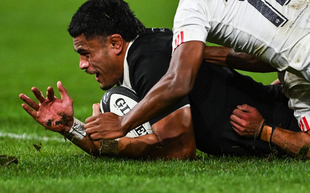 All Blacks loose forward Tupou Vaa'i scores in the second test win over France.