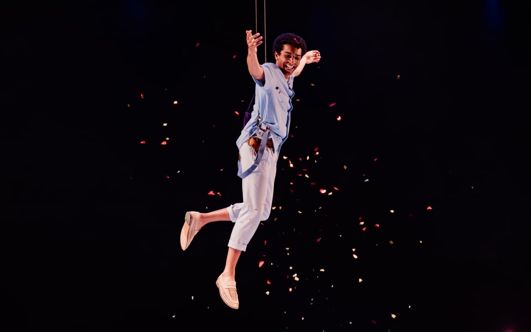 Peter Pan (Theo Shakes) is suspended above the stage in an impressive show of technical theatrics.