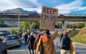 The protest moved to line the road entering the Shotover Wastewater Treatment Plant.