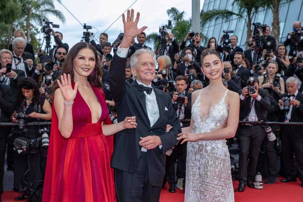 France, Cannes, 2023-05-16. Carys Zeta Douglas, Michael Douglas and Catherine Zeta-Jones on the red carpet of the Palais des Festival de Cannes, during the opening night in Cannes France. . Photograph by Roland MACRI / Hans Lucas.
France, Cannes, 2023-05-16. Carys Zeta Douglas, Michael Douglas et Catherine Zeta-Jones sur le tapis rouge du Palais des Festival de Cannes, lors de la soiree d ouverture a Cannes France. Photographie de Roland MACRI / Hans Lucas. (Photo by Roland Macri / Hans Lucas / Hans Lucas via AFP)