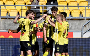 Alex Rufer, left, celebrates with Wellington Phoenix teammates after scoring the first goal in their A-League men's clash against Adelaide United at Sky Stadium, Wellington, 29 November 2025.                                                                    
Copyright photo: Masanori Udagawa /  www.photosport.nz