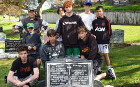 Members of the New Plymouth Boys’ High School  1st and 2nd Eleven in Te Henui cemetery New Plymouth