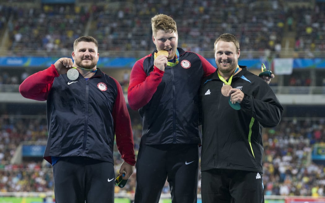 New Zealand's Tom Walsh (R) on the podium with gold medal winner USA's Ryan Crouser and Joe Kovacs, silver, at the 2016  Rio Olympics.