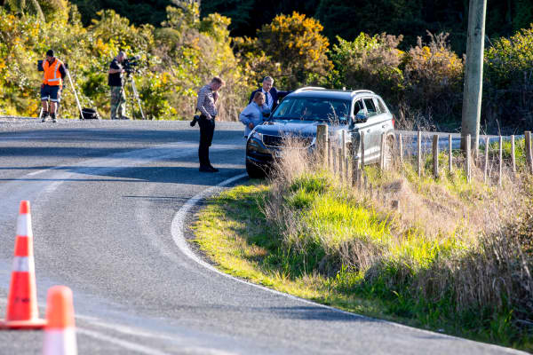 The scene where the Police have put a cordon in place close to the spot on Te Anga Road where Tom Phillips was shot dead by Police.