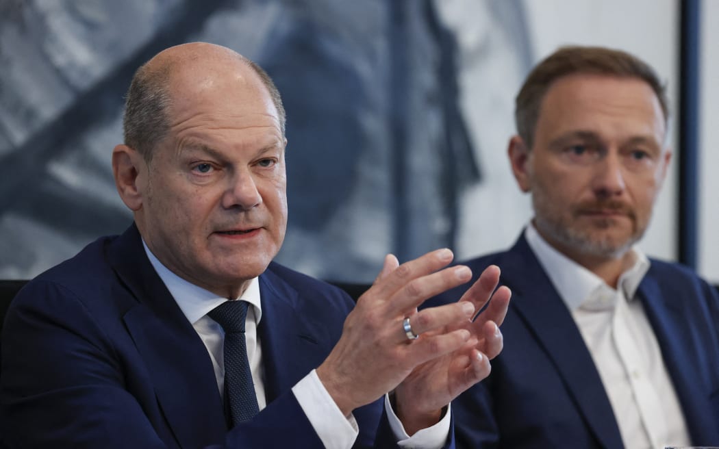 German Chancellor Olaf Scholz and Finance Minister and Free Democrats Party (FDP) leader Christian Lindner address a press conference on the government coalition's relief plan to cope with soaring energy costs on 4 September, 2022.