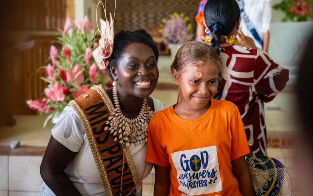 May Torowi Hasola (left), pictured in Solomon Islands for the Miss Pacific Islands pageant, has been subjected to online abuse. (Supplied: Miss Bird of Paradise PNG)