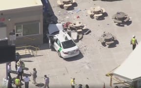 A vehicle has crashed into pedestrians near Boston's Logan International Airport.