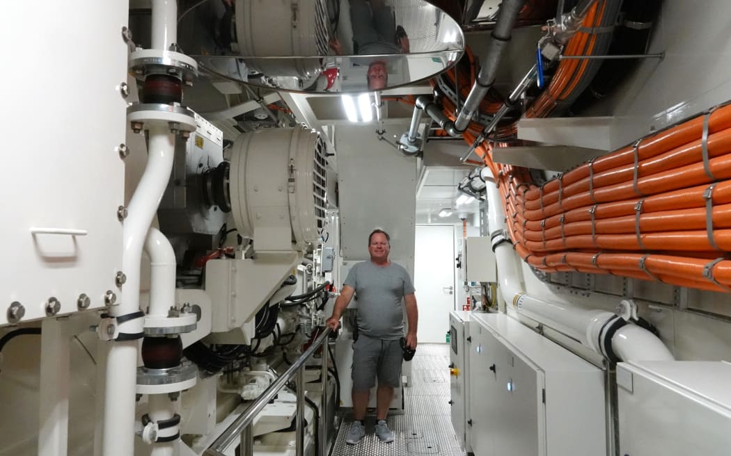 Captain Aaron Clark in the ship’s engine room.