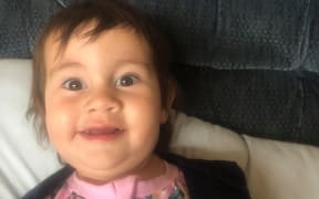 Ivy Dyas looking brighter after her surgery to remove her teeth.