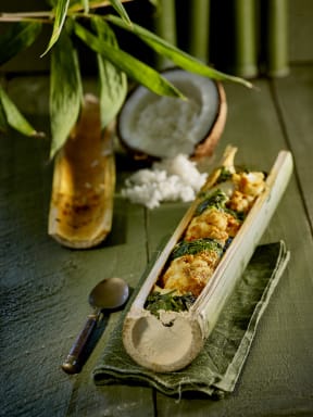 Curried fish in bamboo with coconut rice