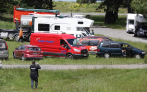 Dozens of people wait to be allowed to travel out of Kaikoura on the inland route.