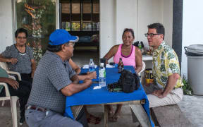 David Henkin (right) meets with Tinian residents concerned about proposed US military training on their island.