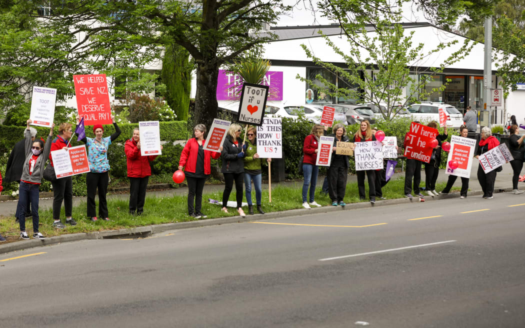Nurses protest / strike for equal pay on Bealey Ave, Christchurch