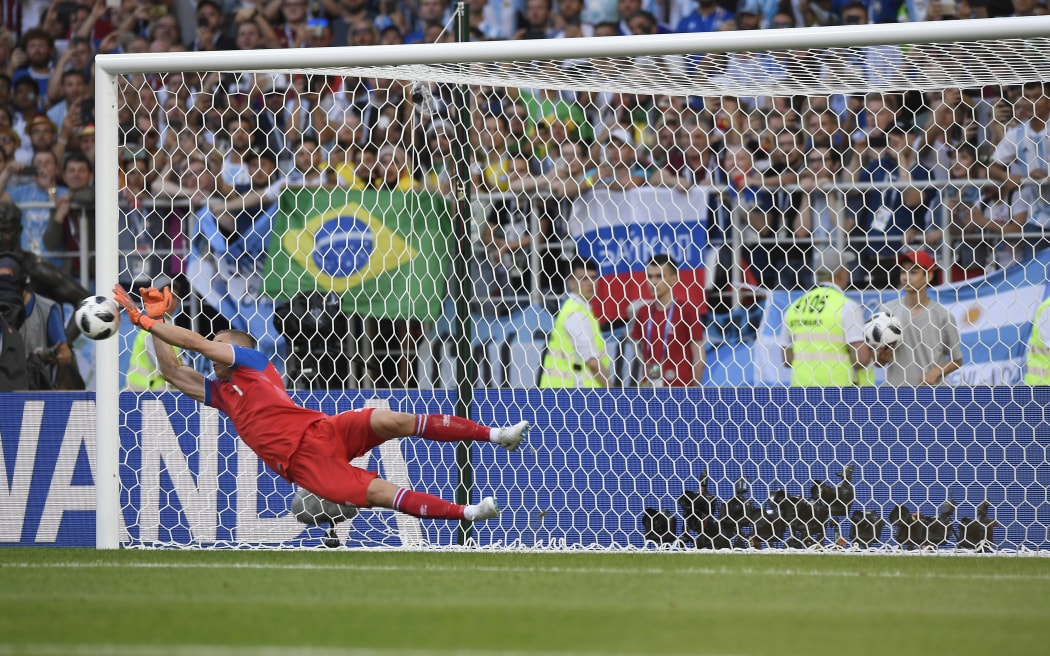 Iceland keeper Hannes Por Halldorsson saves a penalty.