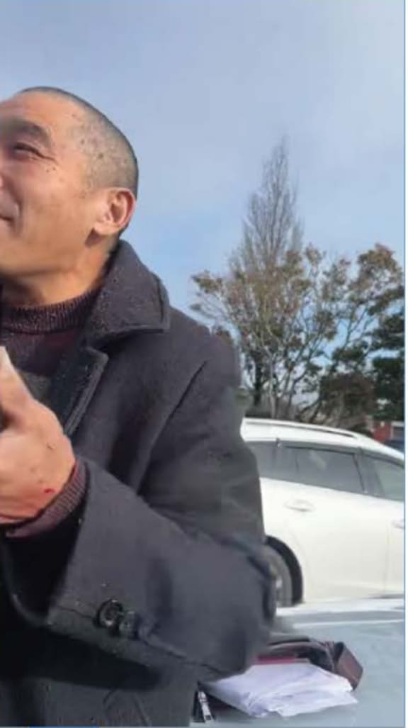 Tingjun Cao was filmed by police during a traffic stop on 22 July 2023.