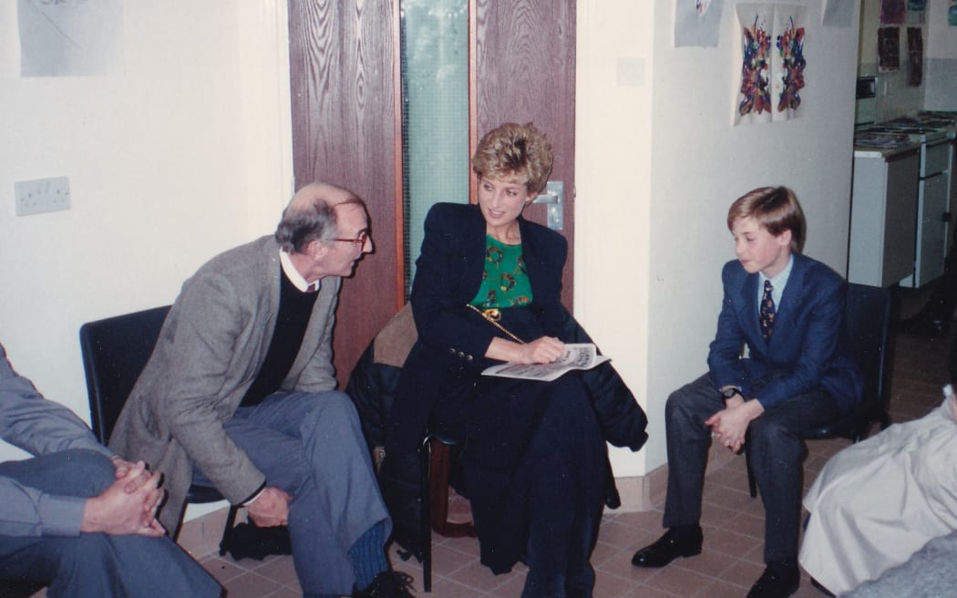 This handout photograph released by Kensington Palace on 25 October, 2024, shows Britain's Princess Diana (C) with her 11-year-old son William (R), now Britain's Prince William, Prince of Wales during one of his first visits to homelessness charity, The Passage in London, taken on December 14, 1993. - "Prince William: We Can End Homelessness" – a two-part documentary series which follows the first year of The Prince’s Homewards programme  will be shown on ITV on Wednesday October, 30 and Thursday October 31, 2024. (Photo by THE PASSAGE / AFP) / NO USE AFTER DECEMBER 31, 2024 00:00:00 GMT - RESTRICTED TO EDITORIAL USE - MANDATORY CREDIT "AFP PHOTO / THE PASSAGE " - NO MARKETING - NO ADVERTISING CAMPAIGNS - NO DIGITAL ALTERATION ALLOWED  - DISTRIBUTED AS A SERVICE TO CLIENTS - NO ARCHIVE - NOT TO BE USED AFTER DECEMBER 31, 2024 / *Under embargo until 0001 BST, October 27, 2024*