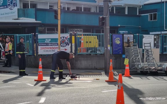 Firefighters using a drone to check the Loafers Lodge hostel building, on Tuesday 16 May, 2023
