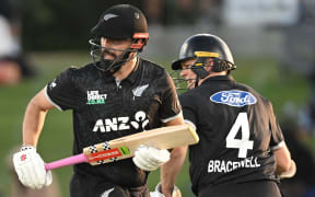 New Zealand’s Daryl Mitchell and Michael Bracewell. Game 1 of the ODI cricket series between New Zealand and England at Bay Oval in Mt Maunganui.