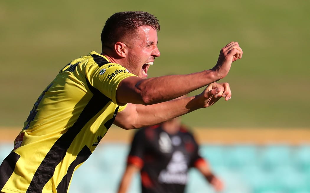 Scott Wootton of the Phoenix celebrates scoring a goal.
