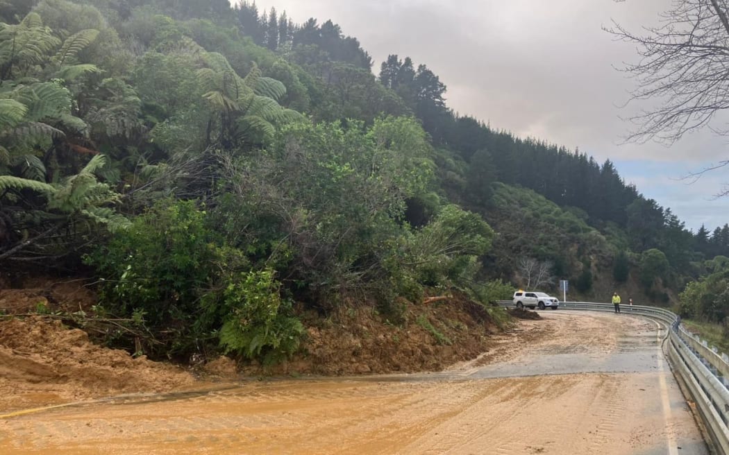 A large washout across a highway during extensive flooding and heavy rain in the Nelson Tasman areas.