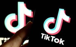 An illustration is being shown in Suqian, China, on January 24, 2024, depicting TikTok’s layoffs in the United States. (Photo by Costfoto/NurPhoto) (Photo by CFOTO / NurPhoto / NurPhoto via AFP)