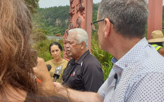 Joe Harawira speaks outside the marae.
