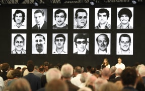 Portraits of the victims are displayed at the end of a ceremony to mark the 50th anniversary of an attack on the 1972 Munich Olympics.