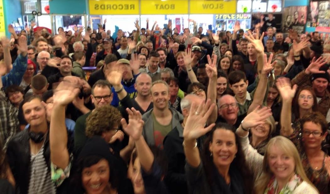 The crowd at Slow Boat Records.