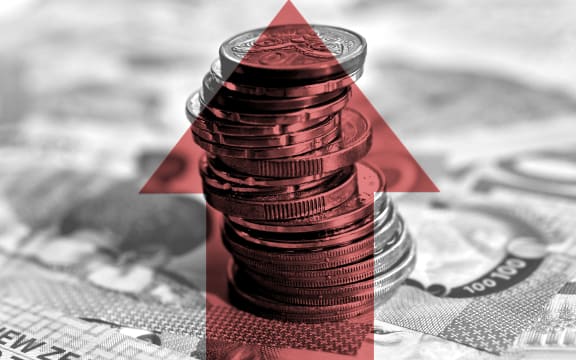 Stack of coins and arrow pointing up