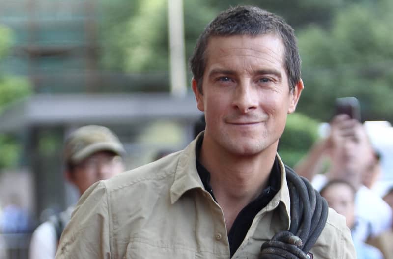 British adventurer and television presenter Bear Grylls poses after abseiling from a high-rise building during a ceremony for the wrap of his new adventure reality TV show "Survivor Games" in Shanghai, China, 27 September 2015.