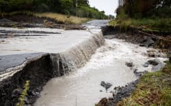 Postmans Rd in Kaikōura has been partially washed away by the bad weather.