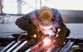 Steel welding or welder industrial in the factory with smoke from welding job.
Harm will happen to health of welder smoke inhalation from steel welding.