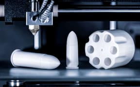 Cartridges and revolver drum are printed in a 3D printer, concepts such as arms trade and weapons production, dangers of new weapons technologies