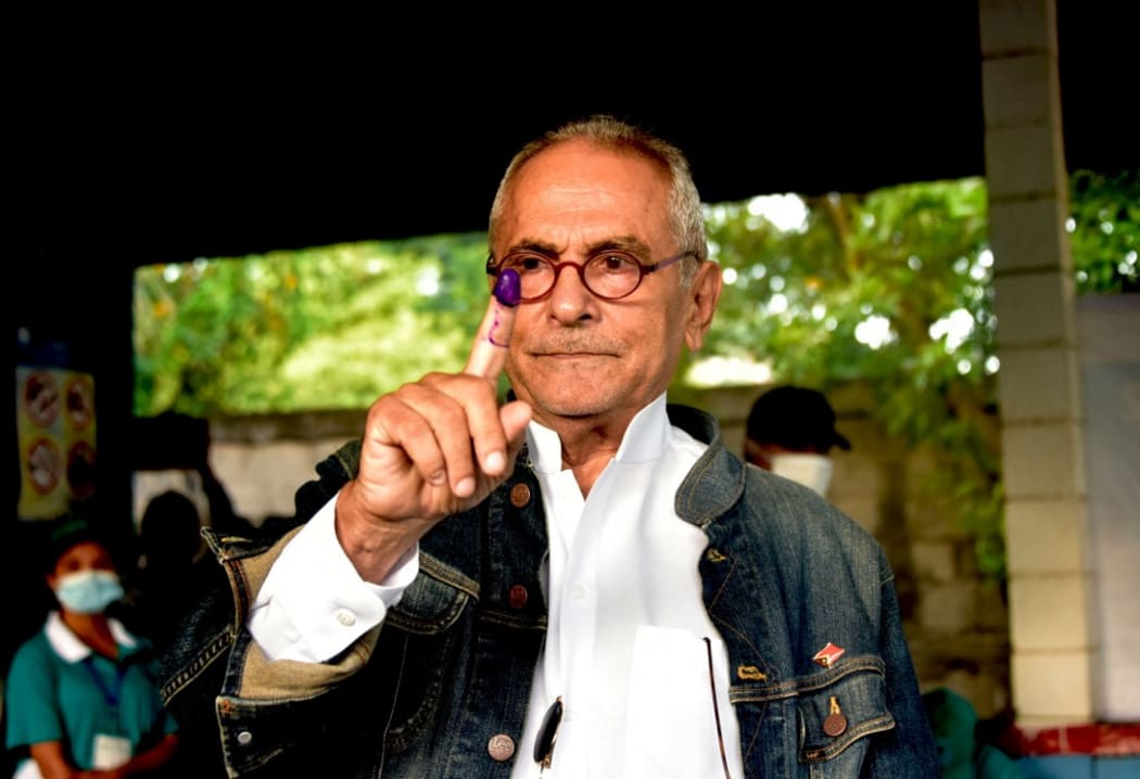 Jose Ramos-Horta, one of the candidates in Timor-Leste's presidential election, gestures as he casts his ballot during the second and final round of voting in the nation's capital, Dili, on 19 April, 2022.