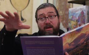Shaun Garea playing indie table-top game Wanderhome.