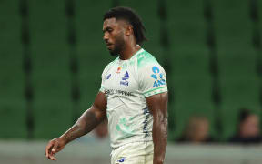 Frank Lomani of Fijian Drua leaves the field.