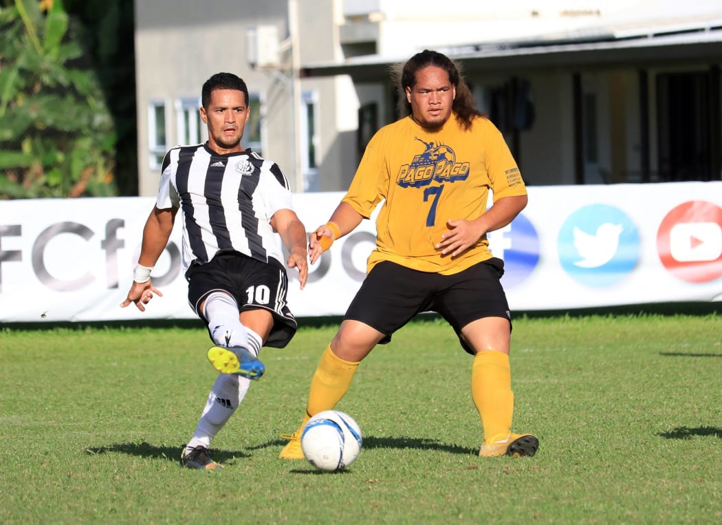 Tupapa Maraerenga President and midfielder Grover Harmon (L) in action against Pago Youth during the 2019 OFC Champions League Qualifying Stage.